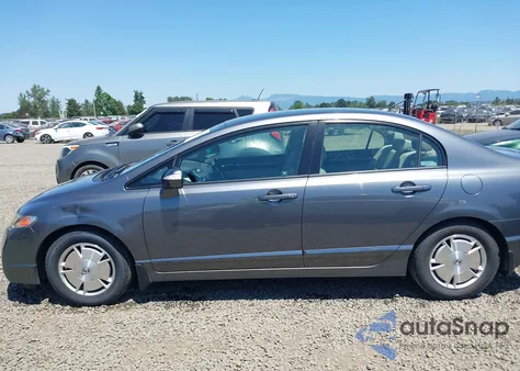 2010 Honda Civic Hybrid из США, поврежденный, VIN JHMFA3F28AS001502